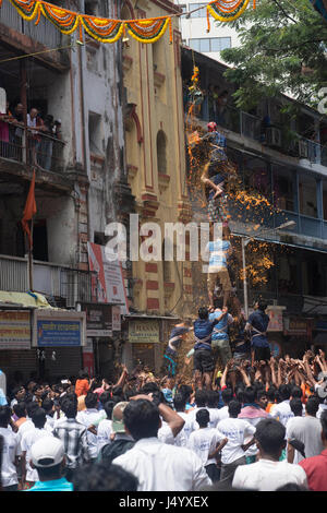 Human pyramid broken dahi handi, mumbai, maharashtra, india, asia Stock Photo