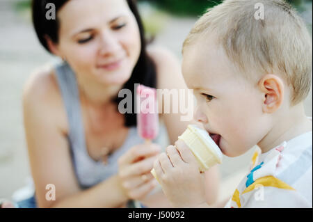 baby and mom eating ice cream Stock Photo