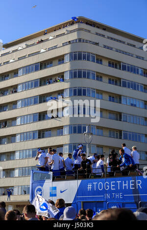 Brighton & Hove, East Sussex, UK, 14 May 2017. Brighton & Hove Albion Football Club parade in open-top buses along Brighton & Hove seafront after securing promotion to the Premier League by finishing second in the Championship. This is the first time since 1983 that Brighton & Hove Albion will play in England's top division. Credit: Clive Jones/Alamy Live News Stock Photo