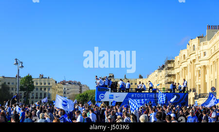 Brighton & Hove, East Sussex, UK, 14 May 2017. Brighton & Hove Albion Football Club parade in open-top buses along Brighton & Hove seafront after securing promotion to the Premier League by finishing second in the Championship. This is the first time since 1983 that Brighton & Hove Albion will play in England's top division. Credit: Clive Jones/Alamy Live News Stock Photo