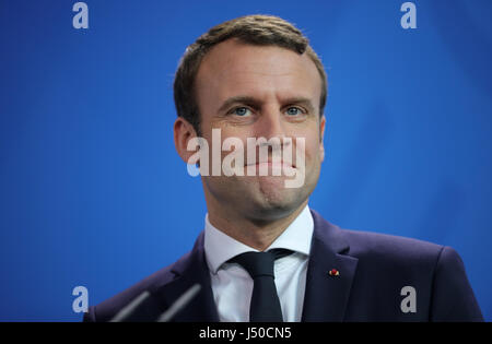 Berlin, Germany. 15th May, 2017. French President Emmanuel Macron attends a joint press conference with German Chancellor Angela Merkel (not pictured) following talks in Berlin, Germany, 15 May 2017. Credit: dpa picture alliance/Alamy Live News