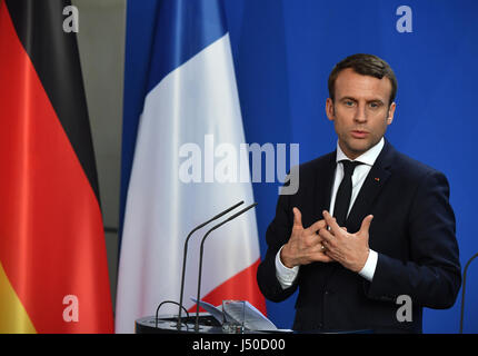Berlin, Germany. 15th May, 2017. French President Emmanuel Macron delivers remarks as he attends a joint press conference with German Chancellor Angela Merkel (not pictured) following talks in Berlin, Germany, 15 May 2017. Credit: dpa picture alliance/Alamy Live News