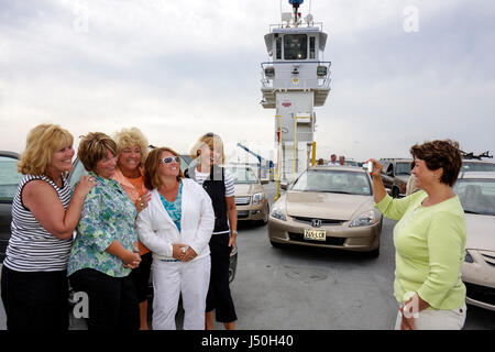 Alabama Fort Morgan,Fort Morgan Ferry,Mobile Bay water,adult adults woman women female lady,women,friends,group,girlfriends' day,ham it up,posing,pose Stock Photo