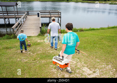 Alabama Millry,Emmett Wood State Lake,fishing,man men male adult adults,boy boys,kid kids child children youngster youngsters youth youths family fami Stock Photo