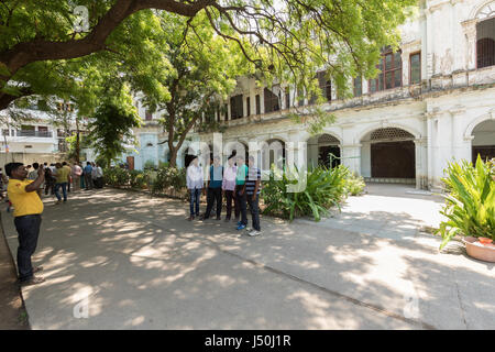 Tourists taking a photo at Nizam's Museum aka Purani Haveli in Hyderabad,India Stock Photo