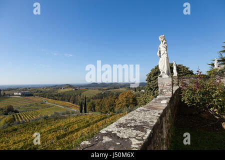 View with statue on the vineyards of Collio, Abbey of Corno di Rosazzo, Friuli, Italy Stock Photo