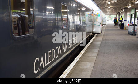 Fort William, Scotland - May 16, 2016: The Caledonian Sleeper train awaits departure from Fort William station for London Euston. Stock Photo