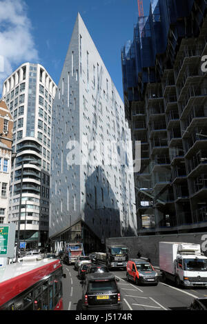 Atlas building under construction next to M Montcalm building Shoreditch luxury hotel on City Road viewed from bus window, London UK  KATHY DEWITT Stock Photo