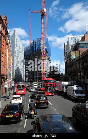 Atlas building under construction next to M Montcalm building Shoreditch luxury hotel on City Road viewed from bus window, London UK  KATHY DEWITT Stock Photo