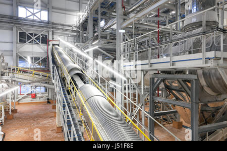 Giant industrial conveyor for chemicals and Ammonium nitrate at a chemical plant Stock Photo