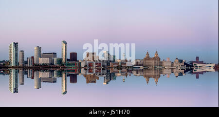 Liverpool sky shot over the river Mersey with the belt of Venus in the background Stock Photo