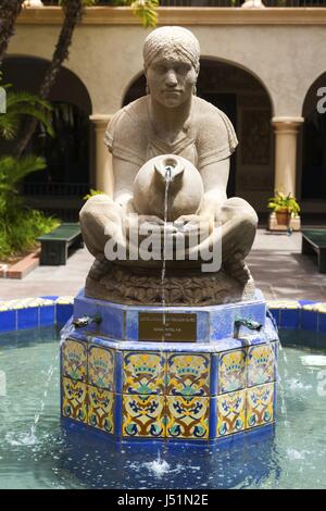 Aztec Woman of Tehuantepec, outdoor 1935 fountain and sculpture by Donal Hord, in Balboa Park's House of Hospitality Courtyard, San Diego California Stock Photo