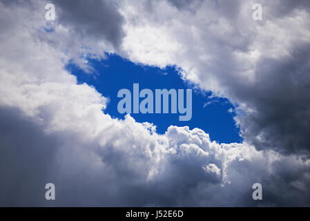 Hole in a cloud Stock Photo