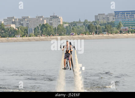 BUCHAREST, ROMANIA - SEPTEMBER 5, 2015. Acrobatic Jetsky pilot training on the lake. Aeronautic show. Stock Photo