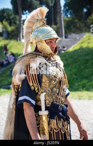 Re-enactors and artifacts at the celebration of the birthday of the city of Rome on the Circus Maximus Grounds in Rome Italy Stock Photo