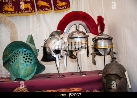 Re-enactors and artifacts at the celebration of the birthday of the city of Rome on the Circus Maximus Grounds in Rome Italy Stock Photo