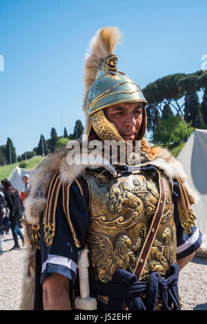 Re-enactors and artifacts at the celebration of the birthday of the city of Rome on the Circus Maximus Grounds in Rome Italy Stock Photo