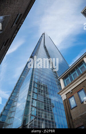 Looking up at The Shard, in London, UK. The Shard was completed in 2012 and stand's 306m tall. It is currently the tallest building in London and the  Stock Photo