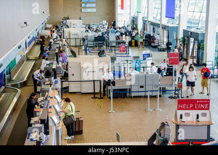 Little Rock Arkansas,Little Rock National Airport,baggage screening,x ray equipment,TSA,Transportation Security Administration,safety,inspectors,airli Stock Photo