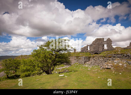 Stunning view of ruined buildings at the disused Foggintor Quarry on Dartmoor National Park, Devon, UK. Sunny day with fluffy clouds and a blue sky Stock Photo