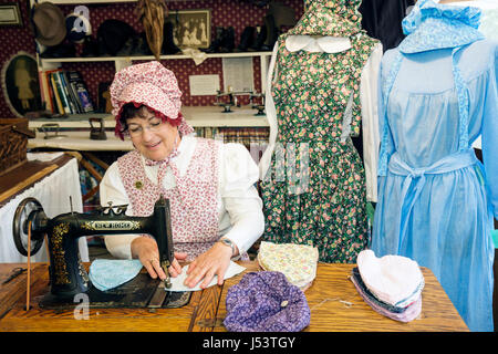 Arkansas Ozark Mountain Mountain View,Ozark Folk Center State Park Country Kitchen sewing shop,woman female women,pioneer dress dresses outfit costume Stock Photo