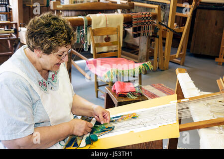 Arkansas Ozark Mountains,Stone County,Mountain View,Ozark Folk Center State Park,Country Kitchen,spinning weaving shop,demonstration,woman female wome Stock Photo