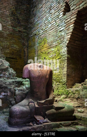 Headless Buddha image at the shrine chamber of Wat Kaew temple in Chaiya, Surat Thani, Thailand. Stock Photo