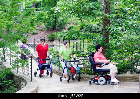 Arkansas Hot Springs,Garvan Woodland Gardens,woman female women,group,disabled,physically impaired,accessible,electric wheelchair,independent,mobility Stock Photo