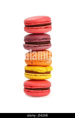 Stack of fresh colorful traditional French macaroon pastry cookies (macarons, macaroni) isolated on white background, close up, low angle view Stock Photo
