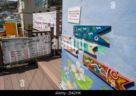 Alleyway with various signs in Gamcheon Culture Village, Busan Gwangyeoksi, South Korea Stock Photo