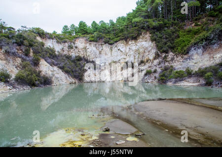 Colourful pond in Wai-O-Tapu Thermal Wonderland which is located in Rotorua, New Zealand. Stock Photo
