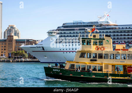 Sydney, Australia. 17th May, 2017. Cruise ship Carnival Spirit arrives in Sydney and docks at Circular Quay. Sydney ferry MV Supply passes by Credit: martin berry/Alamy Live News Stock Photo