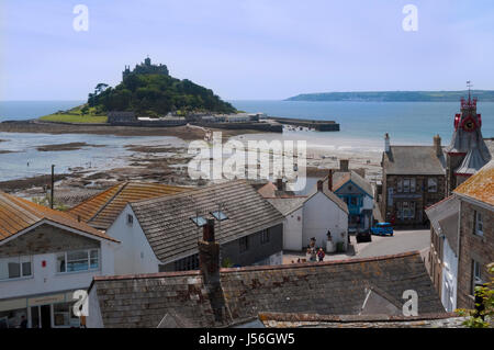 St Michael's Mount at low-tide from Marazion overlooking Market Place and town Museum, Cornwall UK Stock Photo