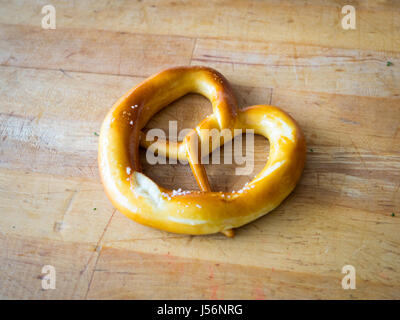 A soft pretzel (butter-and-salt flavour) from Zwick's Pretzels in Edmonton, Alberta, Canada. Stock Photo