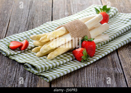Fresh white Asparagus from Germany with strawberries Stock Photo