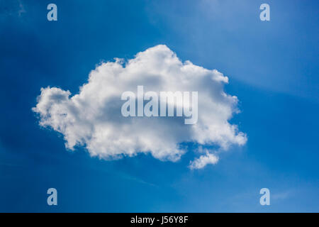 Single white cloud in a pure blue sky above Windermere< Lake District, Cumbria Stock Photo