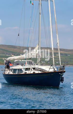 Yacht sailing on Knightstown Harbour, Valentia Island, Ring of Kerry, Ireland Stock Photo