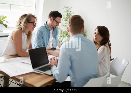 Designers working on new project in modern office Stock Photo
