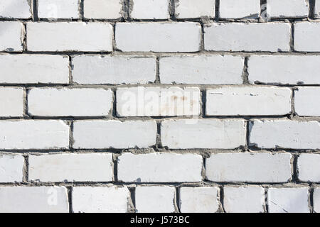 Old brickwork made of white brick Stock Photo