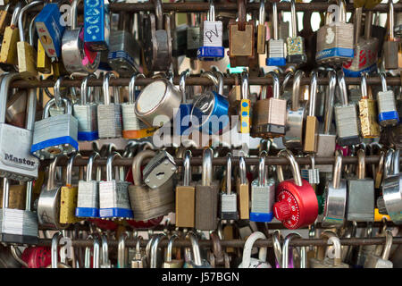 Tucson, Arizona - Lock Your Love sculpture on Fourth Avenue. Sweethearts inscribe their names on a local, place it on the sculpture, and throw away th Stock Photo