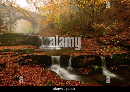 Autum colors, waterfalls and bridge in Rodopi mountain Stock Photo