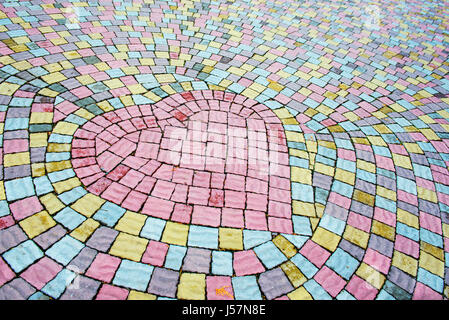 Heart lined with paving stones, background valentine Stock Photo