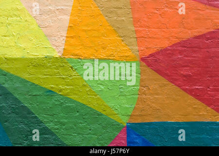 Abstract coloured pattern on brickwork Stock Photo