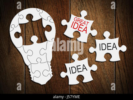 Great idea concept, light bulb from puzzle Stock Photo