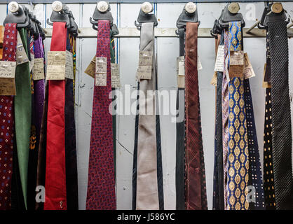 Various vintage neck ties for sale in a second hand shop. Stock Photo