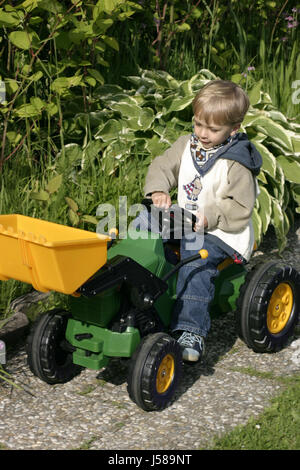 game tournament play playing plays played garden plant male masculine toy jeans Stock Photo