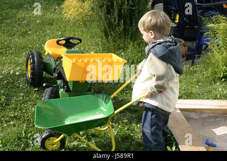 game tournament play playing plays played garden plant green male masculine toy Stock Photo