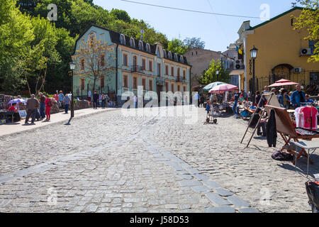 KIEV, UKRAINE - MAY 6, 2017: people on souvenir market on Andriyivskyy Descent in Kiev city in spring. This street connecting Upper Town district and  Stock Photo