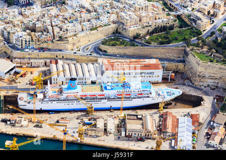 Thomson cruise ship in dry dock for repair, Grand Harbour, Valletta, Malta. Stock Photo