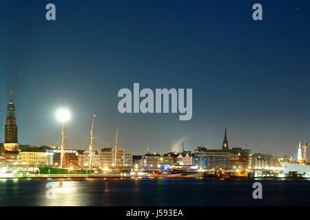 full moon in the port of hamburg Stock Photo